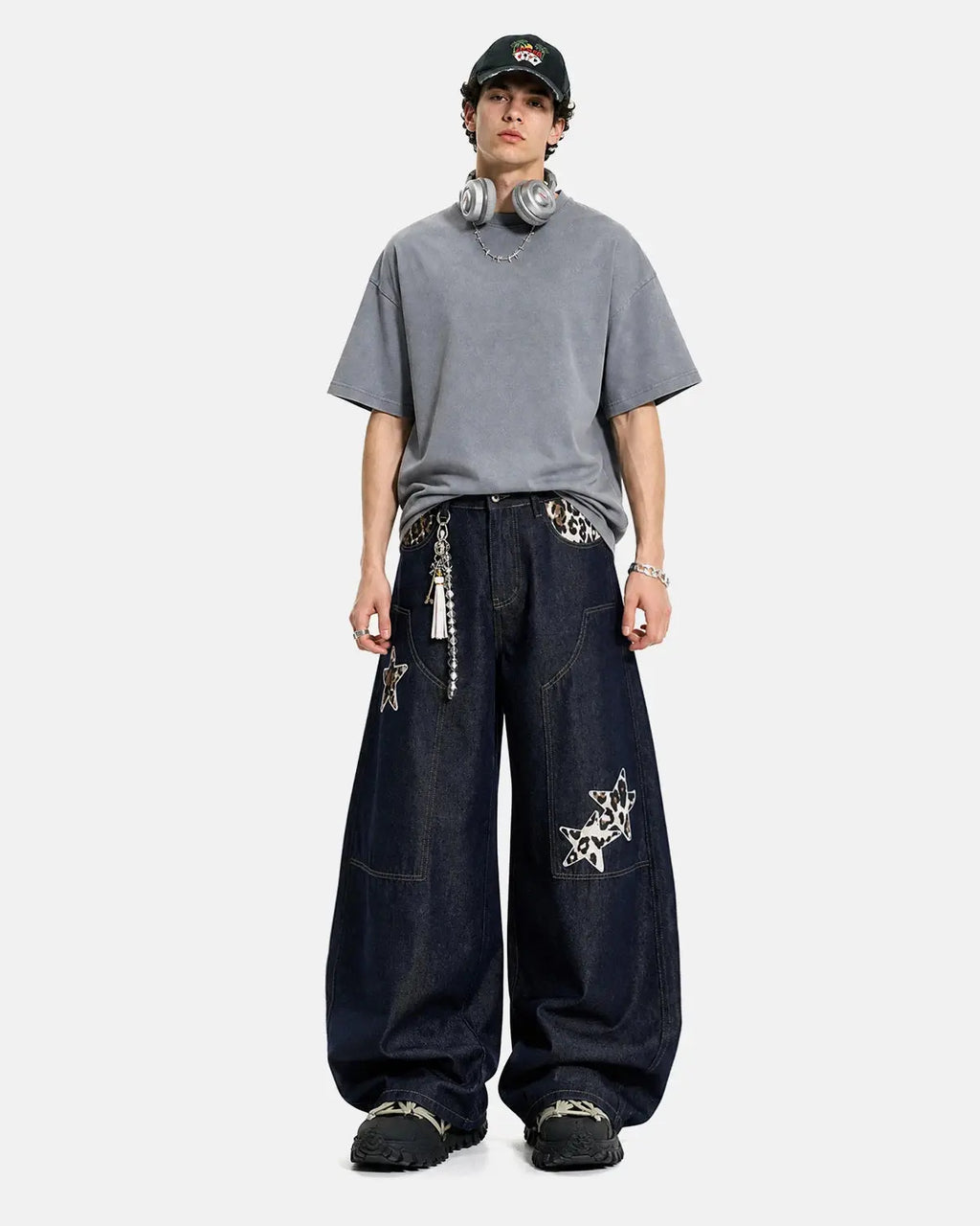 Inflation Streetwear Leopard Star Patch Barrel Jeans showing the distressed denim with star patches and leopard print details.