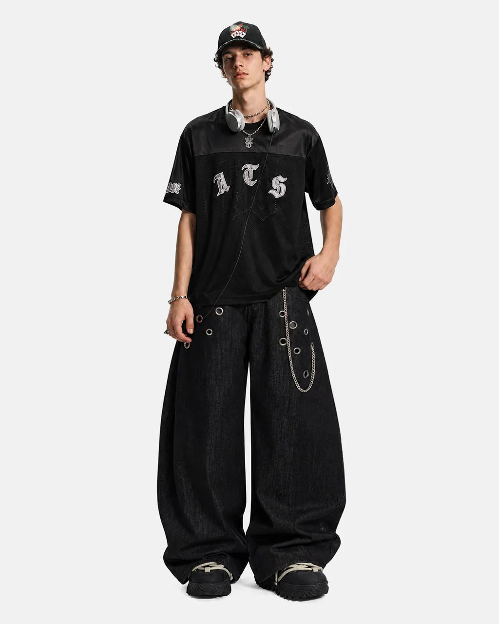 Black gothic embroidered mesh jersey t-shirt by INFLATION Streetwear with intricate embroidery and sheer fabric details.