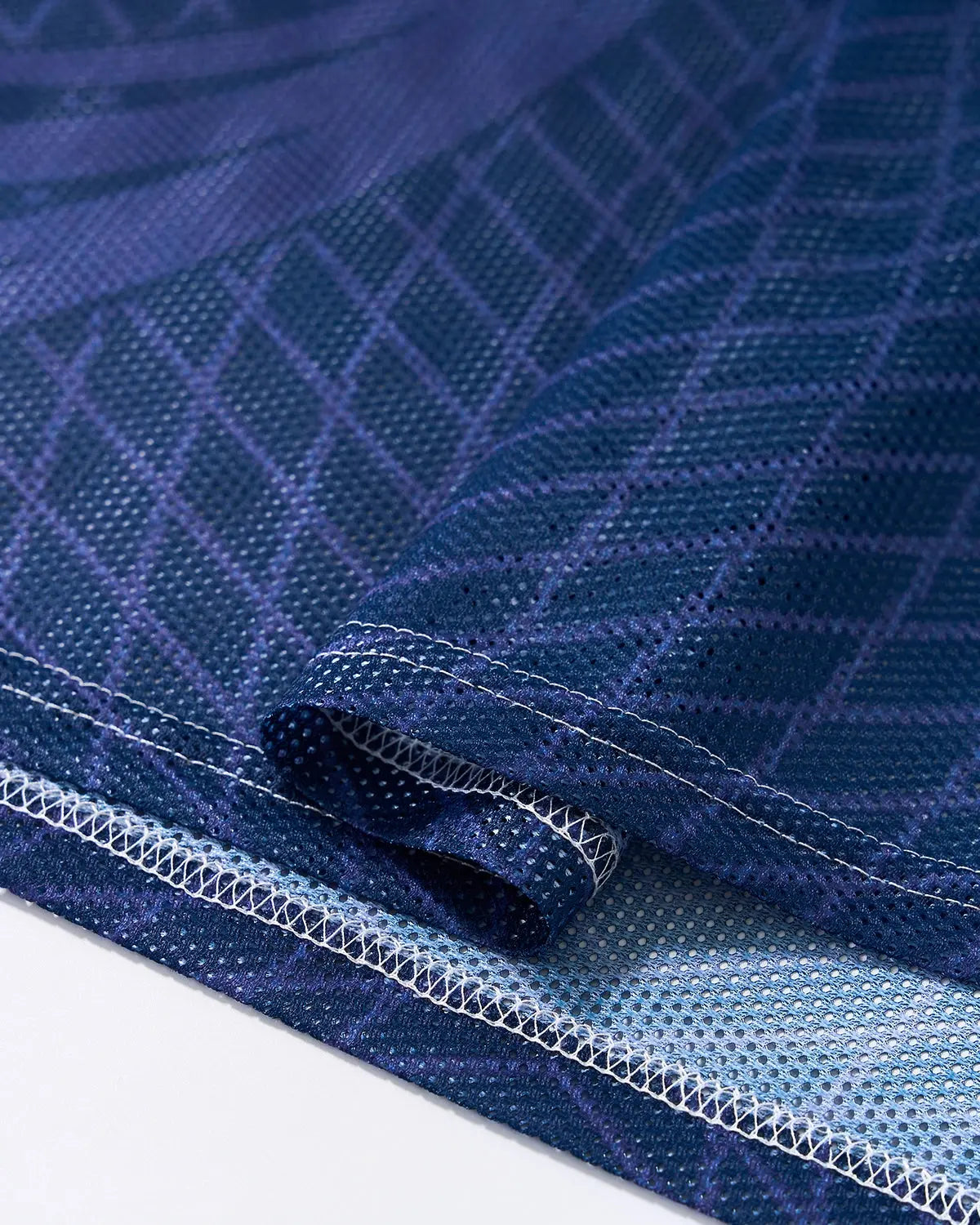 Inflation streetwear geometric pattern mesh jersey T-shirt with bold, colorful design and breathable fabric.