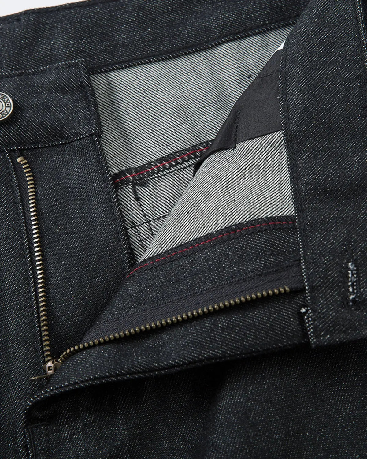 Inflation Super Raw Baggy Jeans with relaxed fit and distressed details, styled for streetwear fashion.