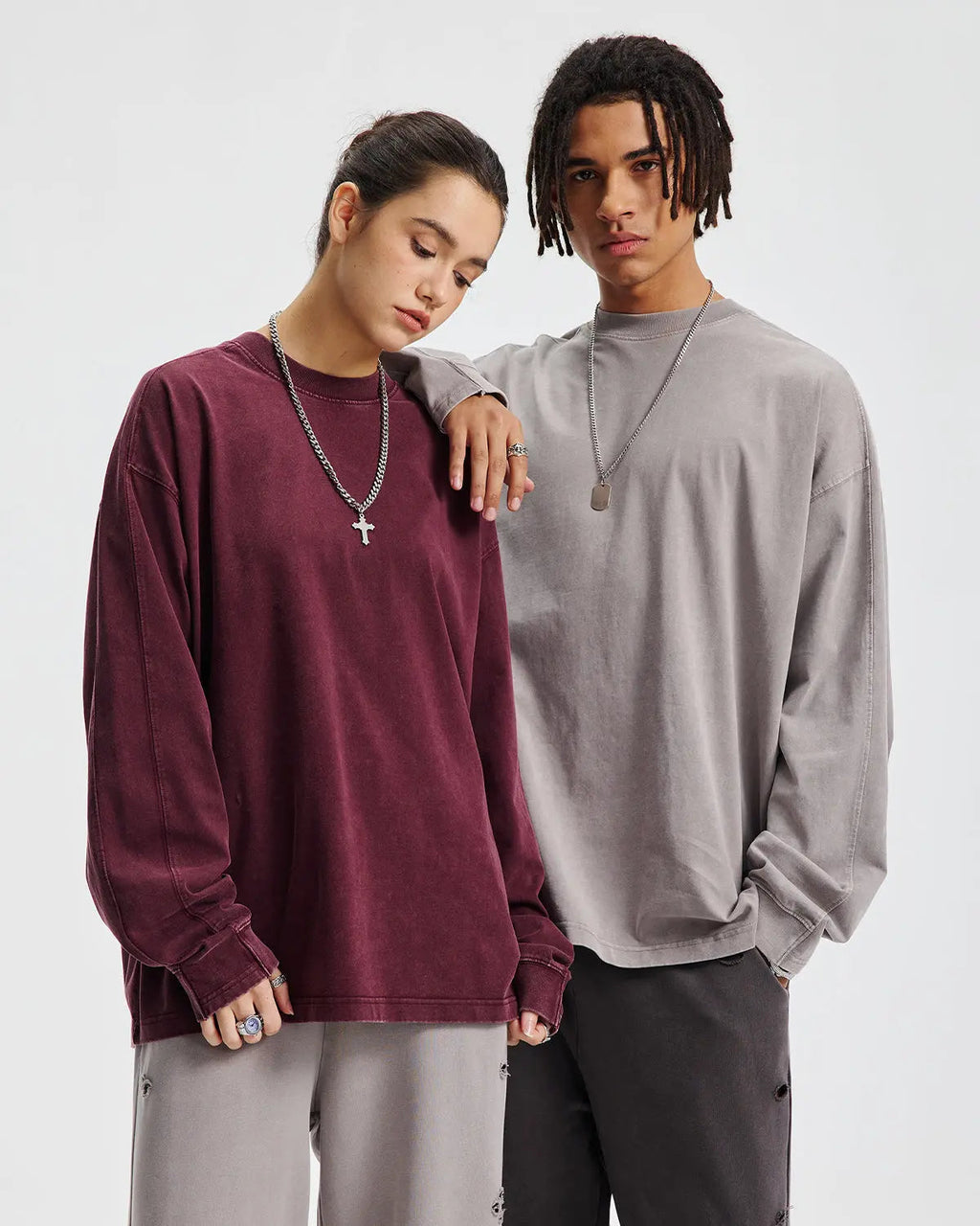 Distressed acid wash oversized long sleeve tee by Flation, showing a casual, worn-in streetwear style with a relaxed fit.