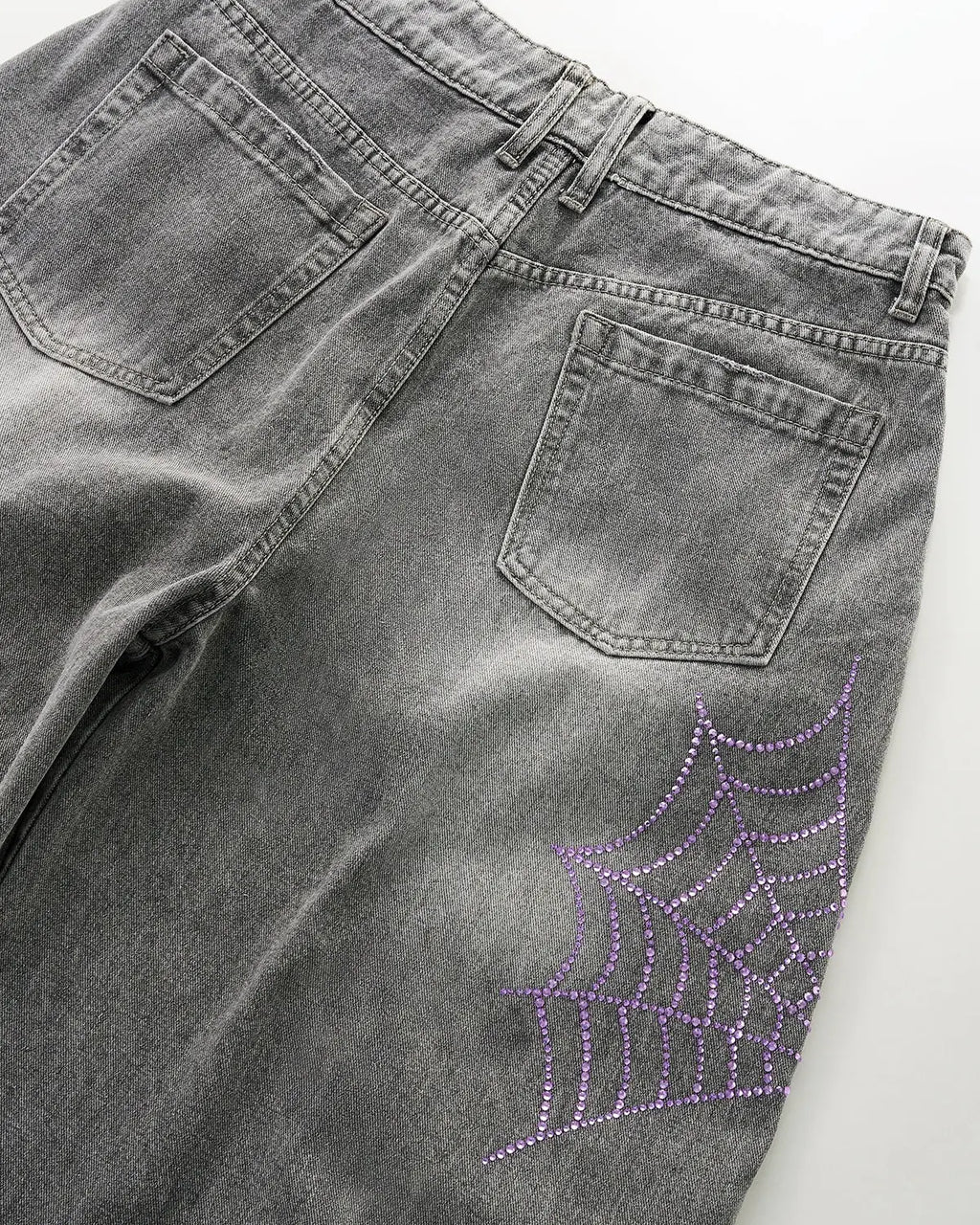 Flation Spider Graphic Rhinestone Barrel Jeans showing detailed spider and rhinestone embellishments on stylish denim pants