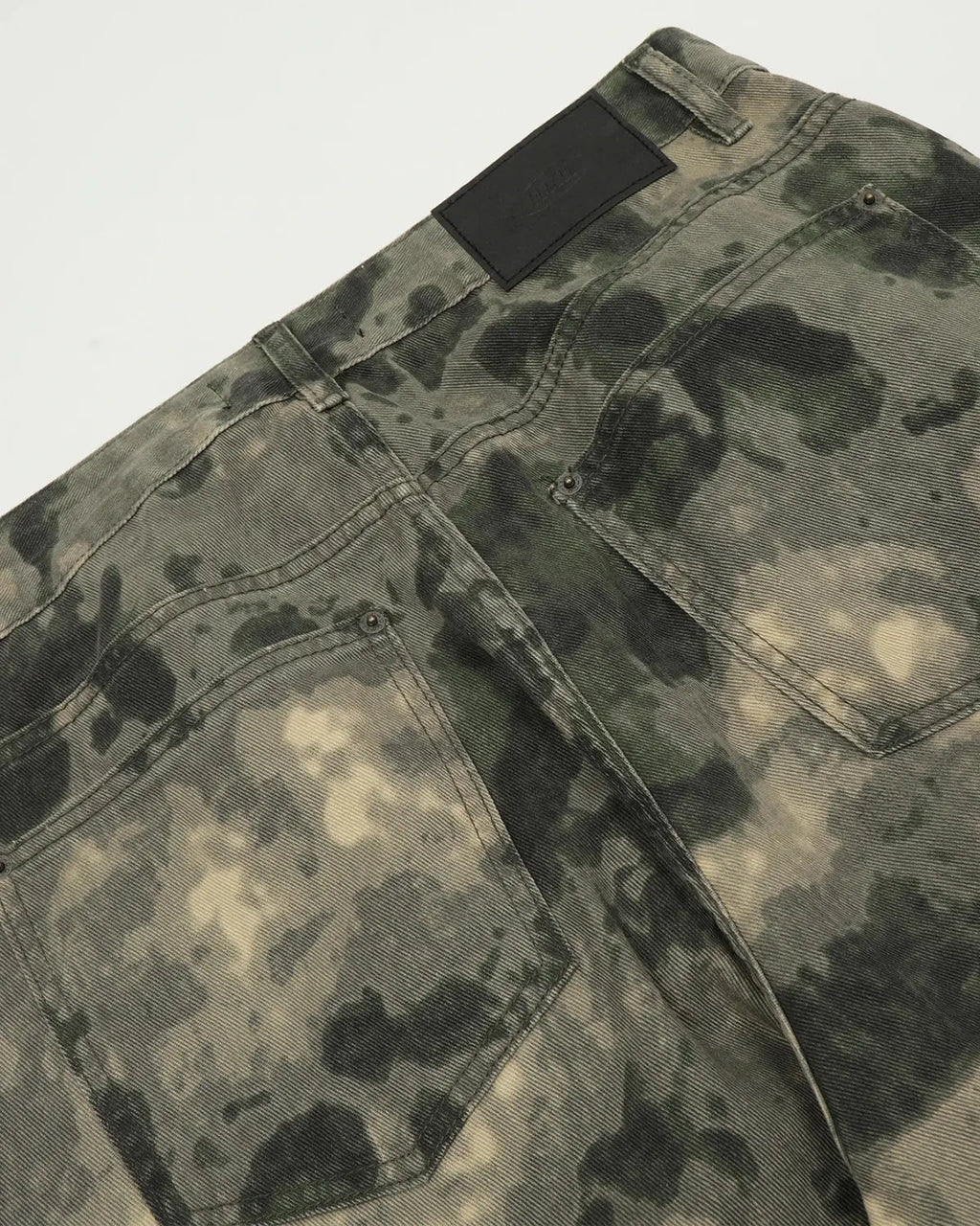 Inflation Camo Multi-Pocket Baggy Cargo Pants with multiple pockets, relaxed fit, and streetwear style in a camouflage pattern.