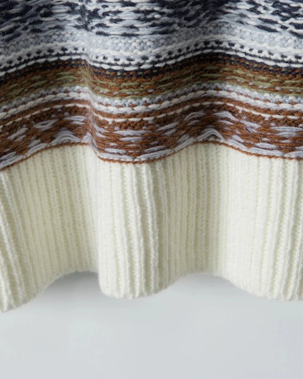 Inflation Streetwear round neck sweater with navy and white stripe jacquard pattern, long sleeves, and ribbed cuffs.