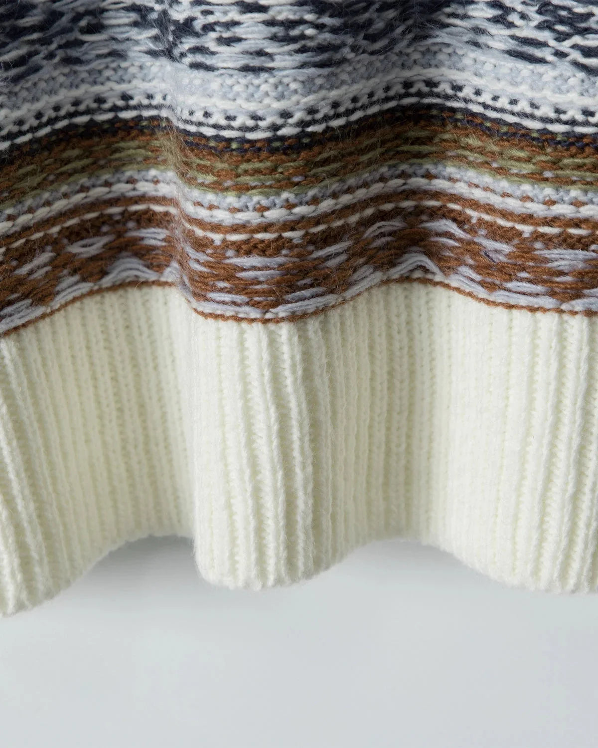 Inflation Streetwear round neck sweater with navy and white stripe jacquard pattern, long sleeves, and ribbed cuffs.