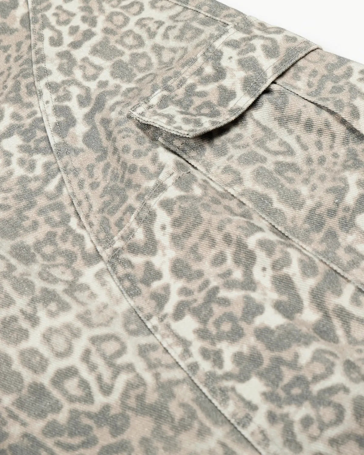 Leopard pattern cargo barrel pants by INFLATION featuring a relaxed fit, multiple pockets, and streetwear style.