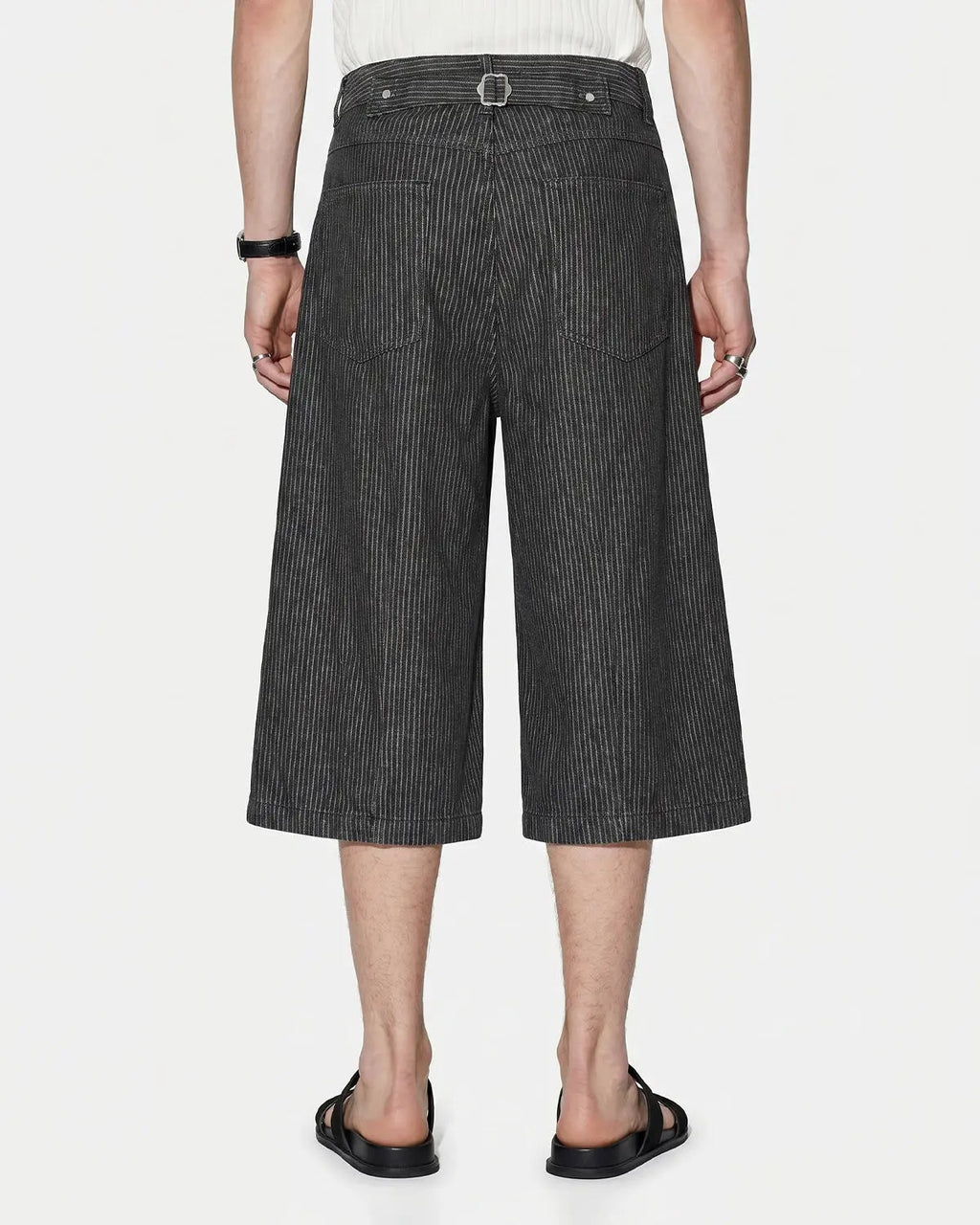 Inflation Streetwear striped button fly baggy jorts pants with red, white, and blue vertical stripes and relaxed fit.