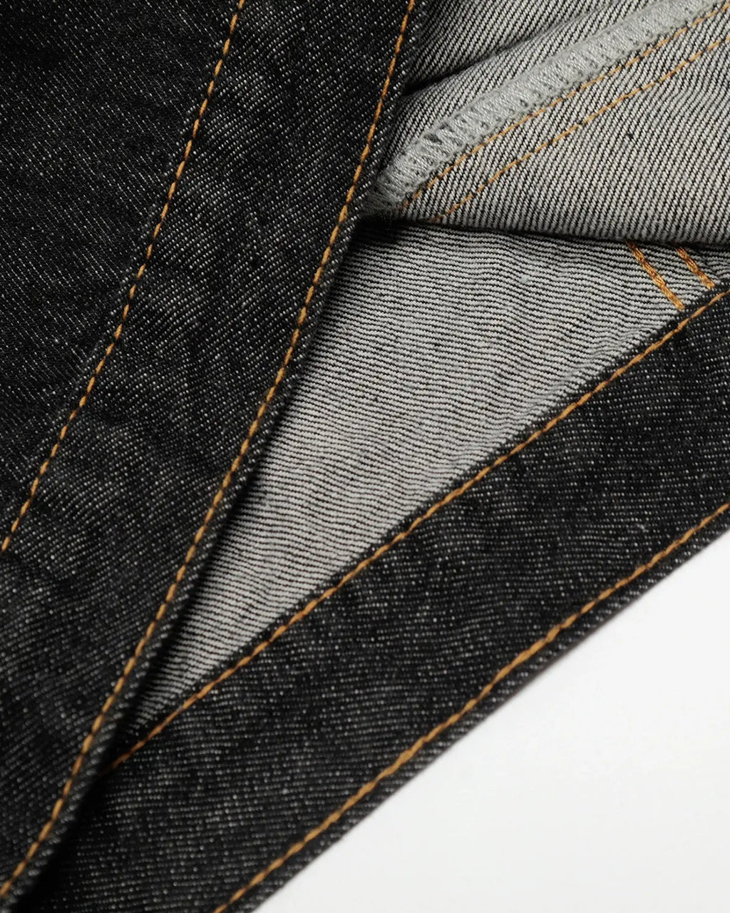 Black multi-pockets denim jacket by INFLATION with stylish streetwear design and functional pockets, close-up view of the jacket.