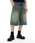 Retro washed denim shorts by Flation, stylish distressed jorts with a classic streetwear look, shown on a model.