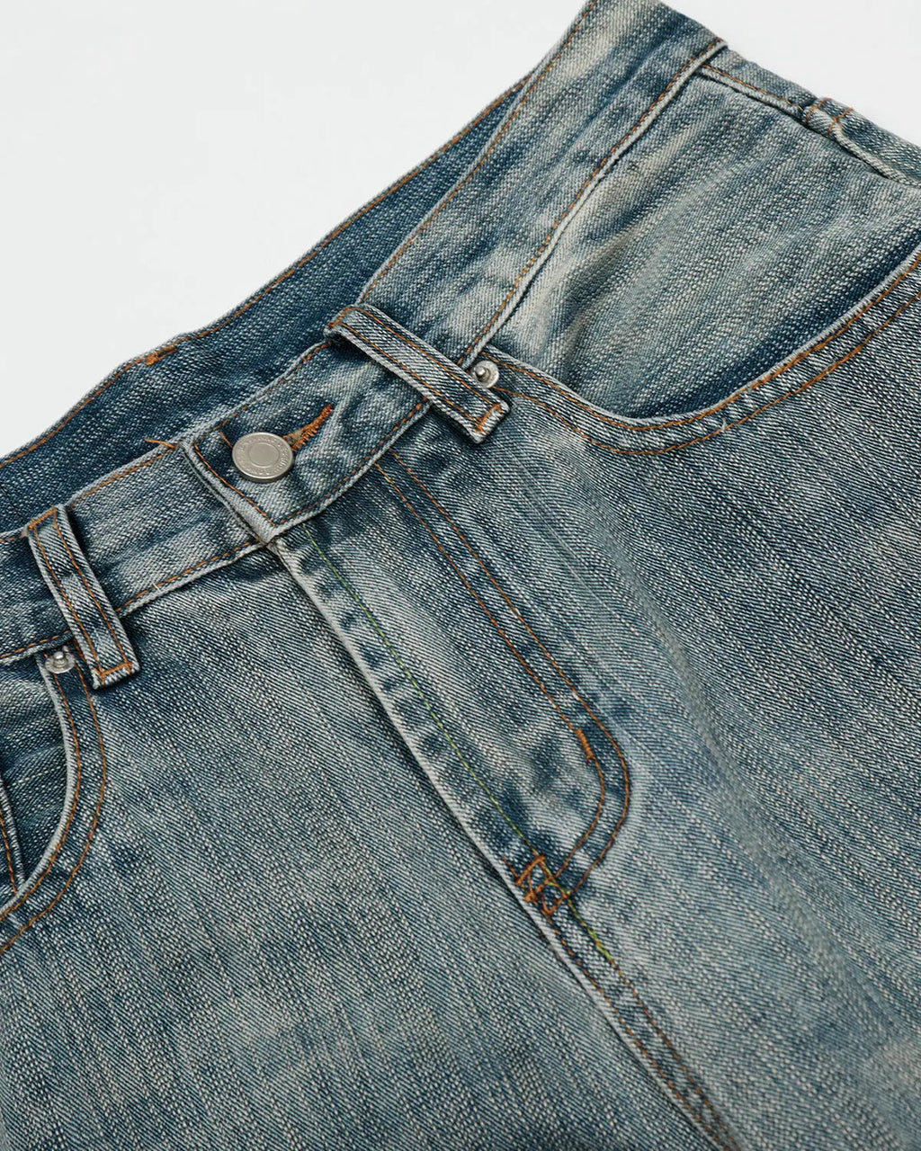 Bamboo weave distressed baggy jeans by INFLATION, featuring relaxed fit, ripped details, and casual streetwear style.