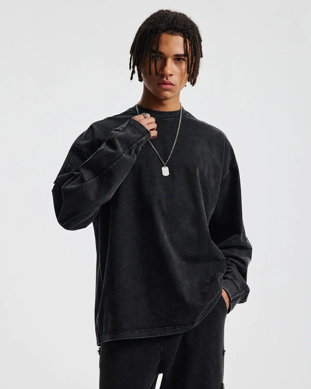 Distressed acid wash oversized long sleeve tee by Flation Streetwear, featuring a relaxed fit and vintage-inspired design.