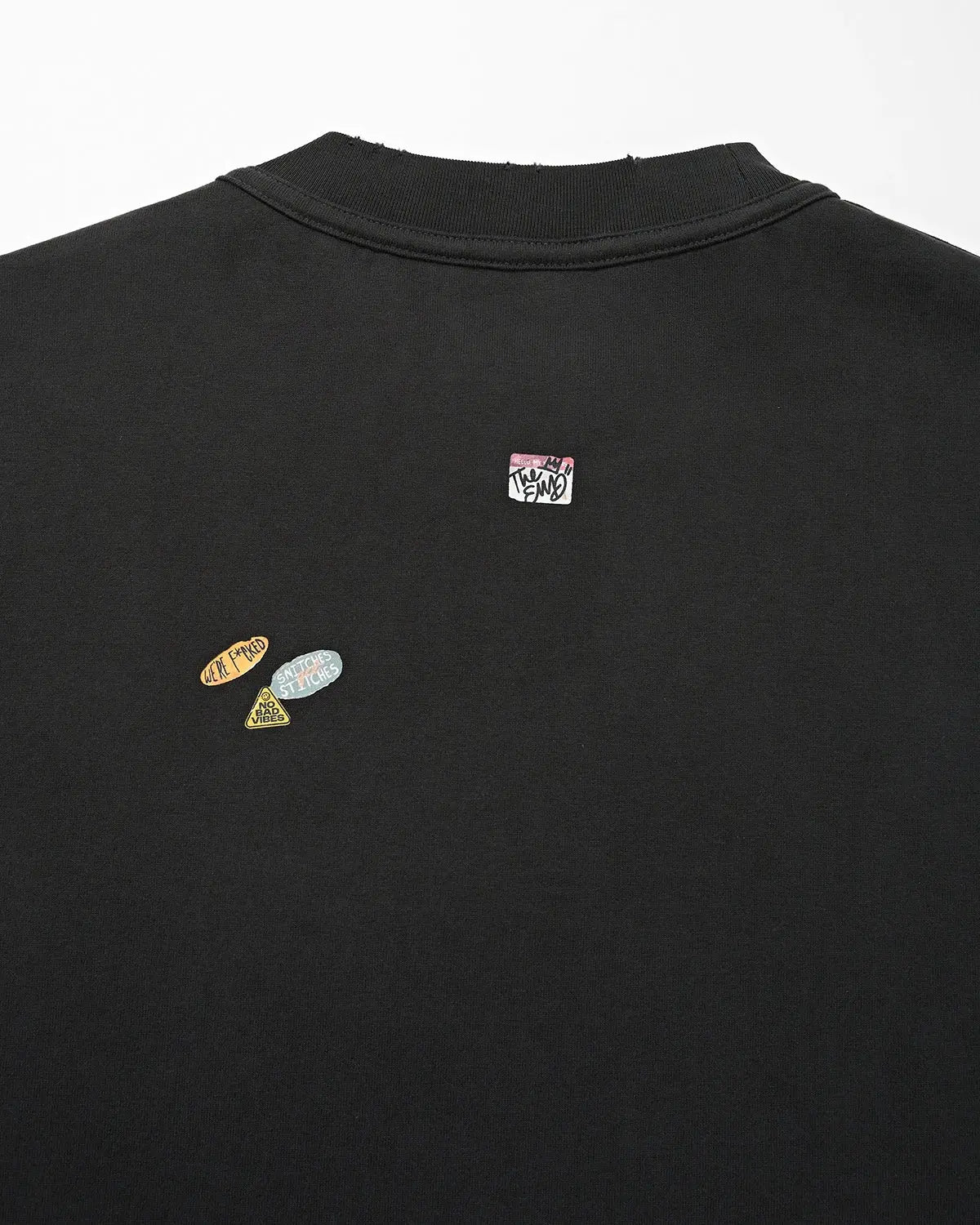 Oversized vintage T-shirt with graphic print from Inflation Streetwear, featuring bold retro-inspired design on soft fabric.