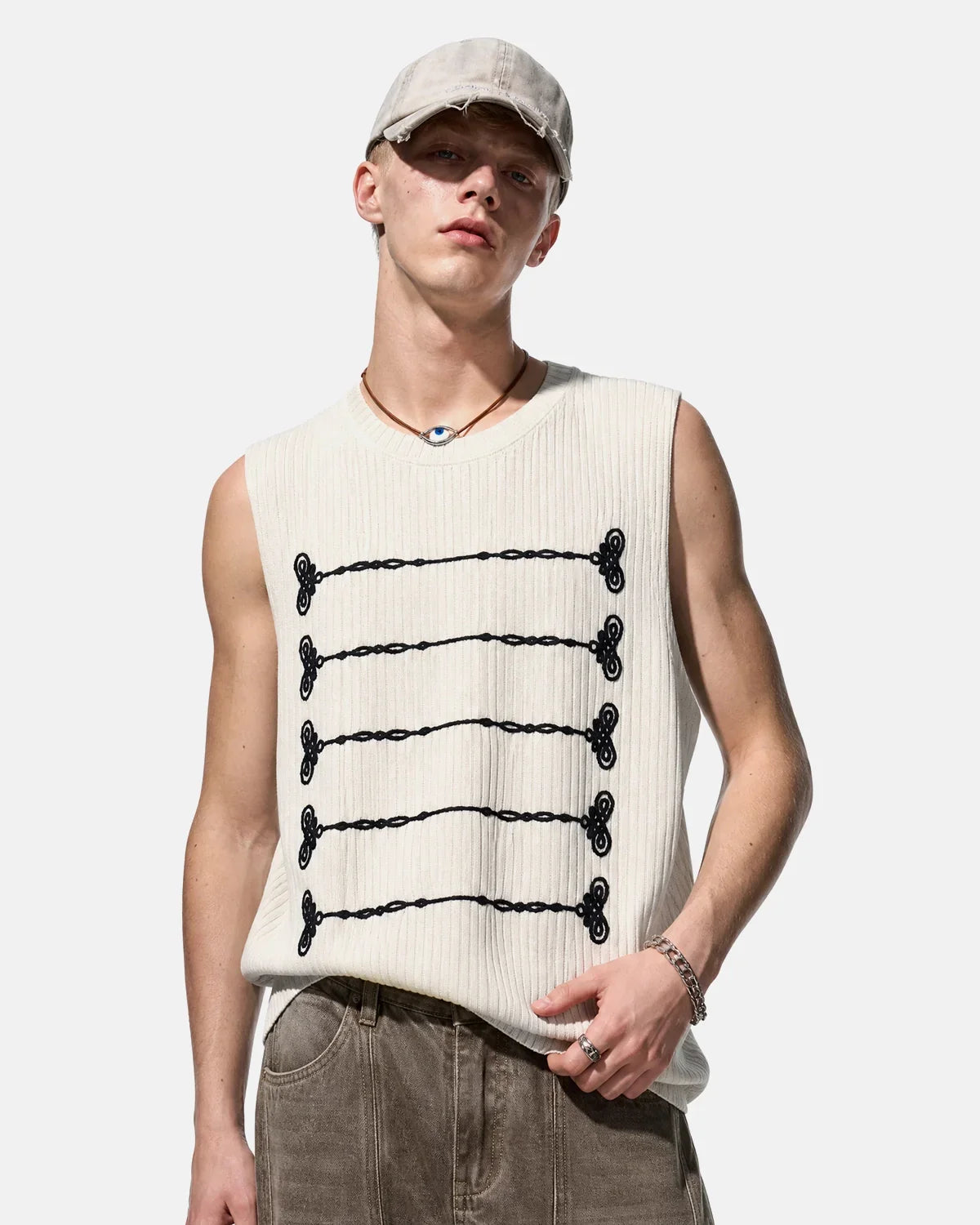 Embroidered knit tank top by INFLATION, featuring detailed embroidery and a relaxed fit, perfect for streetwear style.