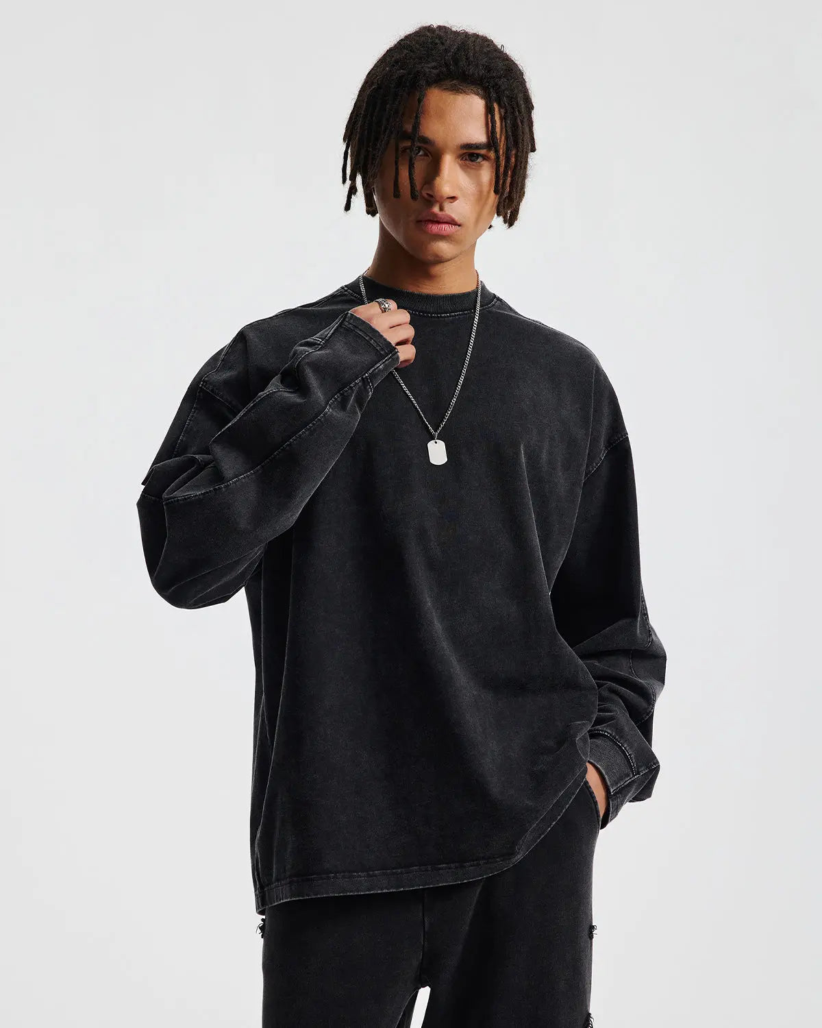 Distressed acid wash oversized long sleeve tee from Flation Streetwear, casual fit with worn, faded fabric and relaxed style.