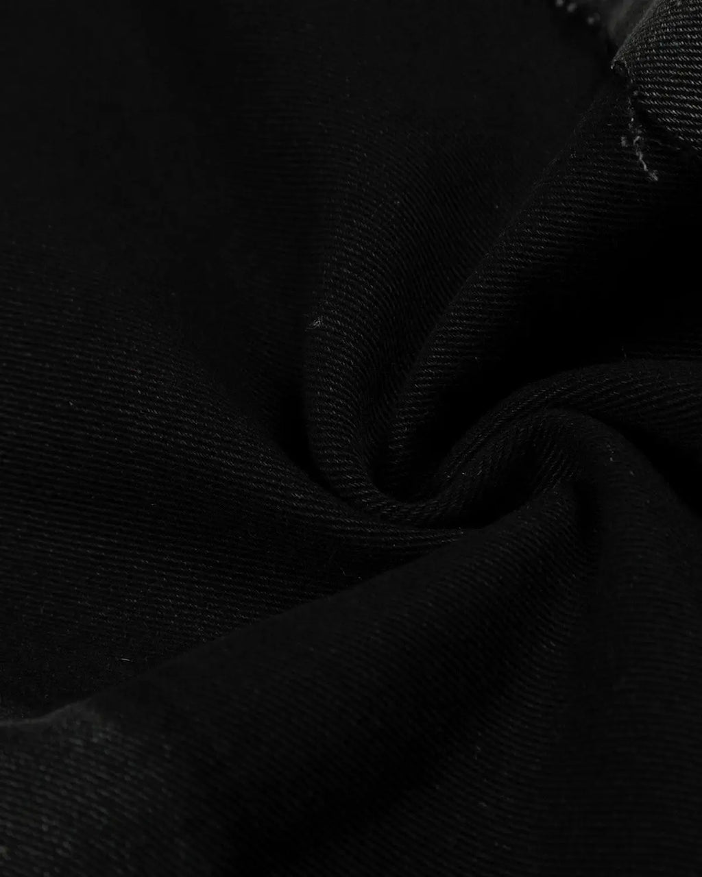Black patchwork barrel jeans by INFLATION featuring a stylish streetwear design with a relaxed fit and unique patch detailing.