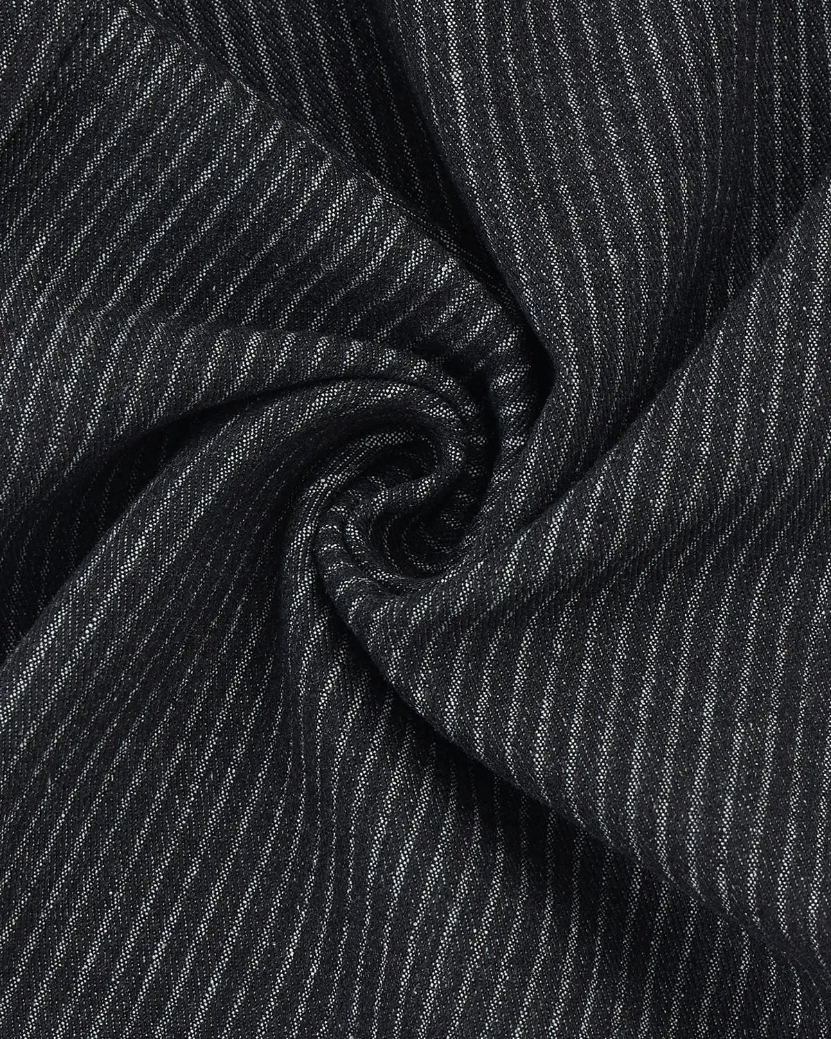 Vintage pinstripe pleated barrel jeans by INFLATION, showing the stylish high-waisted pants with pleats and a relaxed fit.