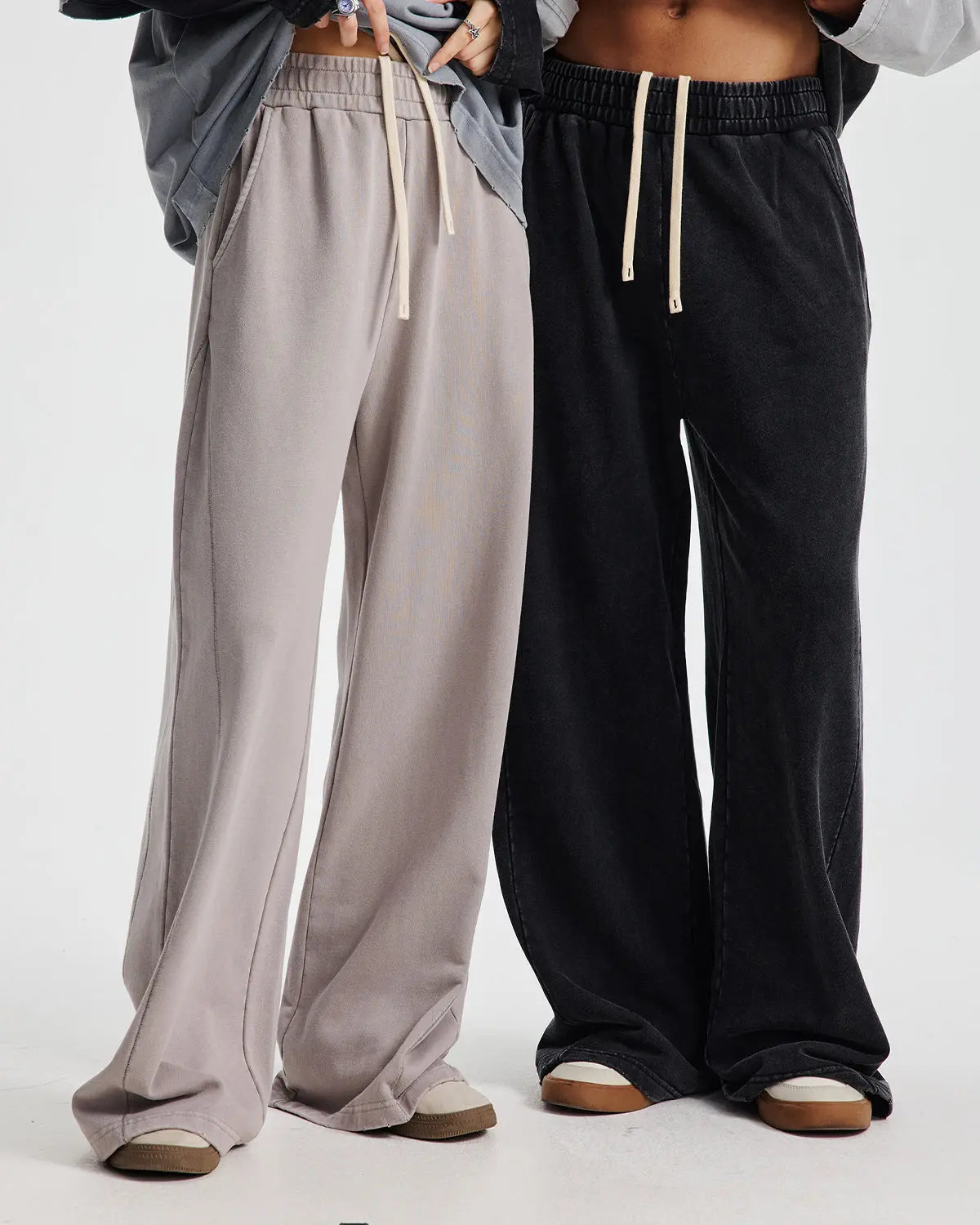 Flation Acid Wash Stitching Straight Leg Sweatpants showing distressed denim-style fabric and detailed stitching on a casual fit pant