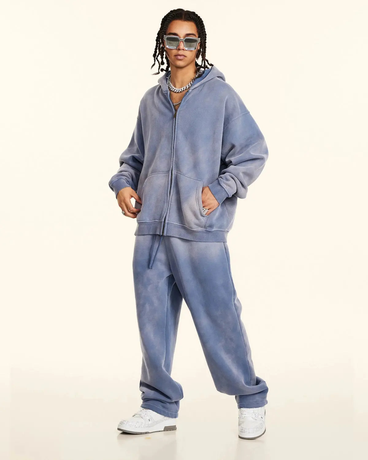 Flation Streetwear straight-leg acid wash sweatpants featuring a relaxed fit and faded denim style on a neutral background.