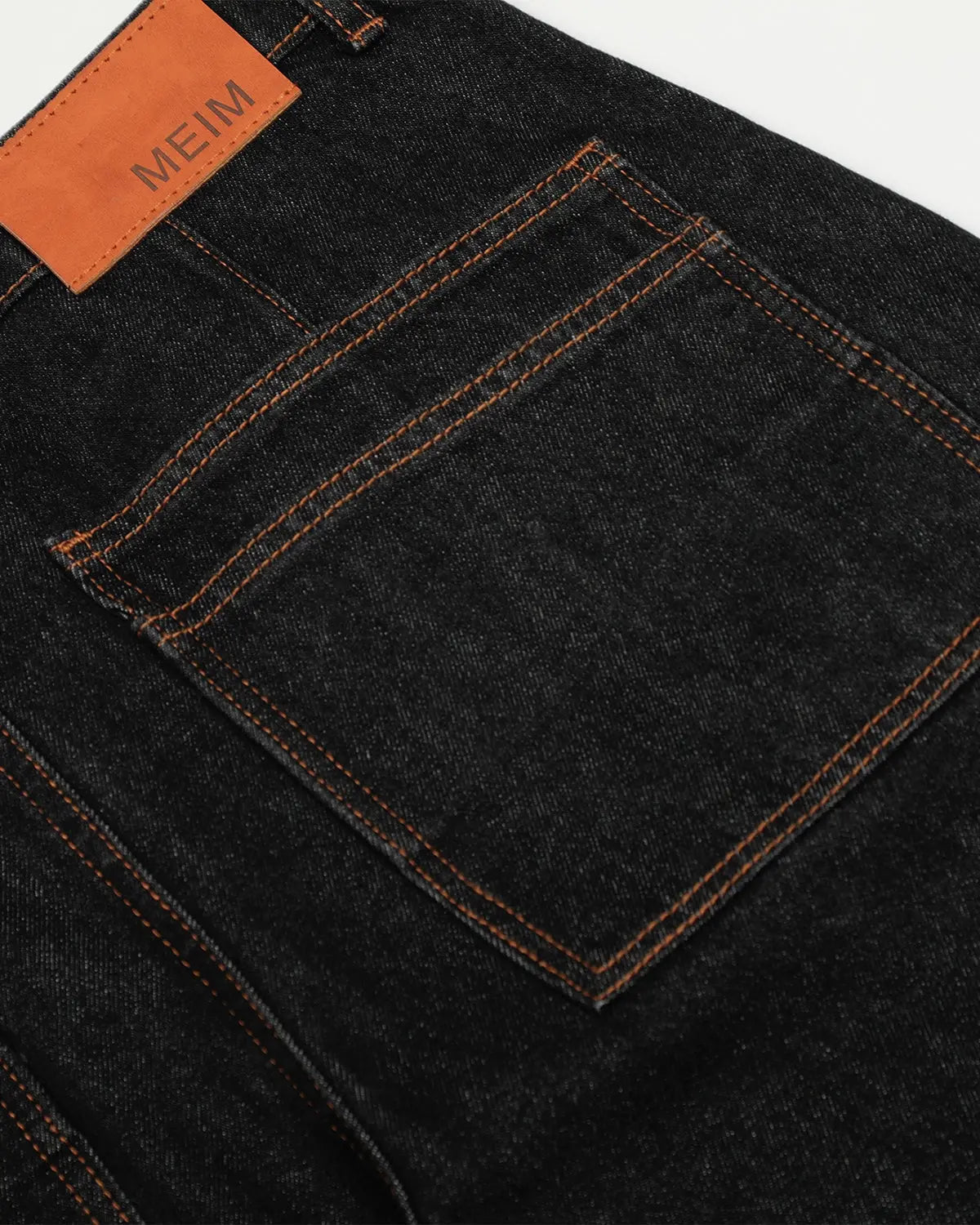 Black Super Barrel jeans by Flation Streetwear, stylish men's pants with a relaxed fit and modern streetwear design.