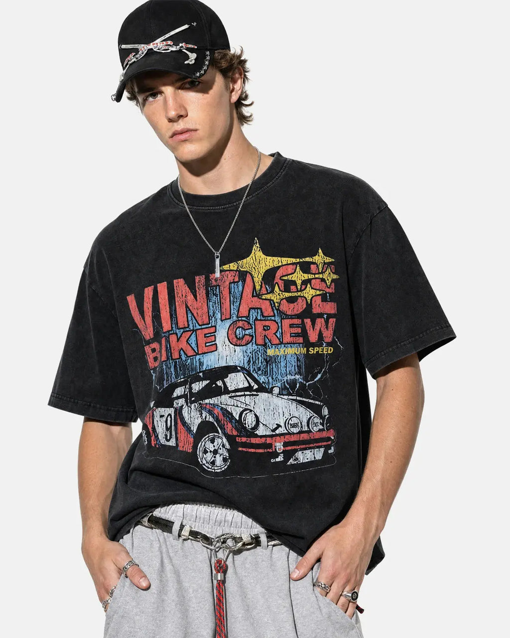 Vintage graphic snow washed T-shirt by INFLATION featuring distressed print and relaxed streetwear style.