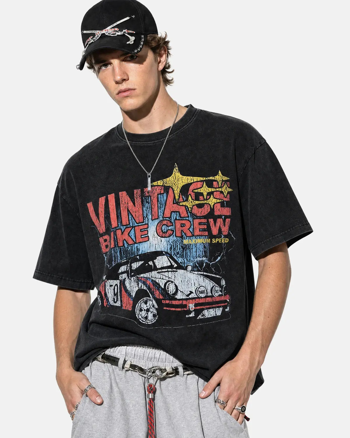 Vintage graphic snow washed T-shirt by INFLATION featuring distressed print and relaxed streetwear style.