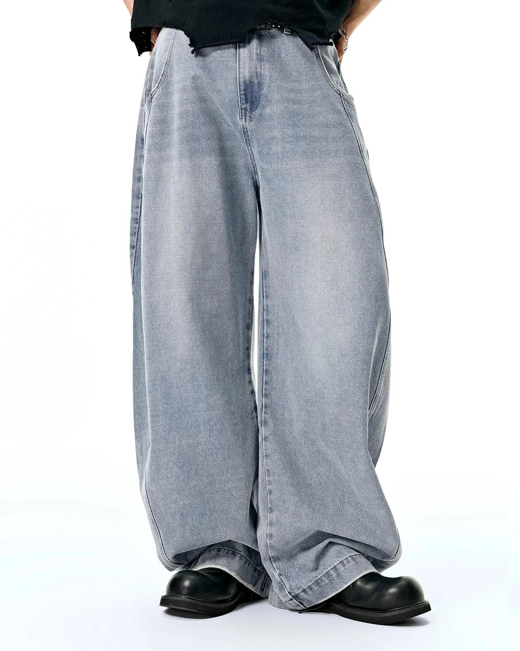 Flation acid-washed distressed barrel jeans, streetwear pants with a relaxed fit and faded, worn-in look.