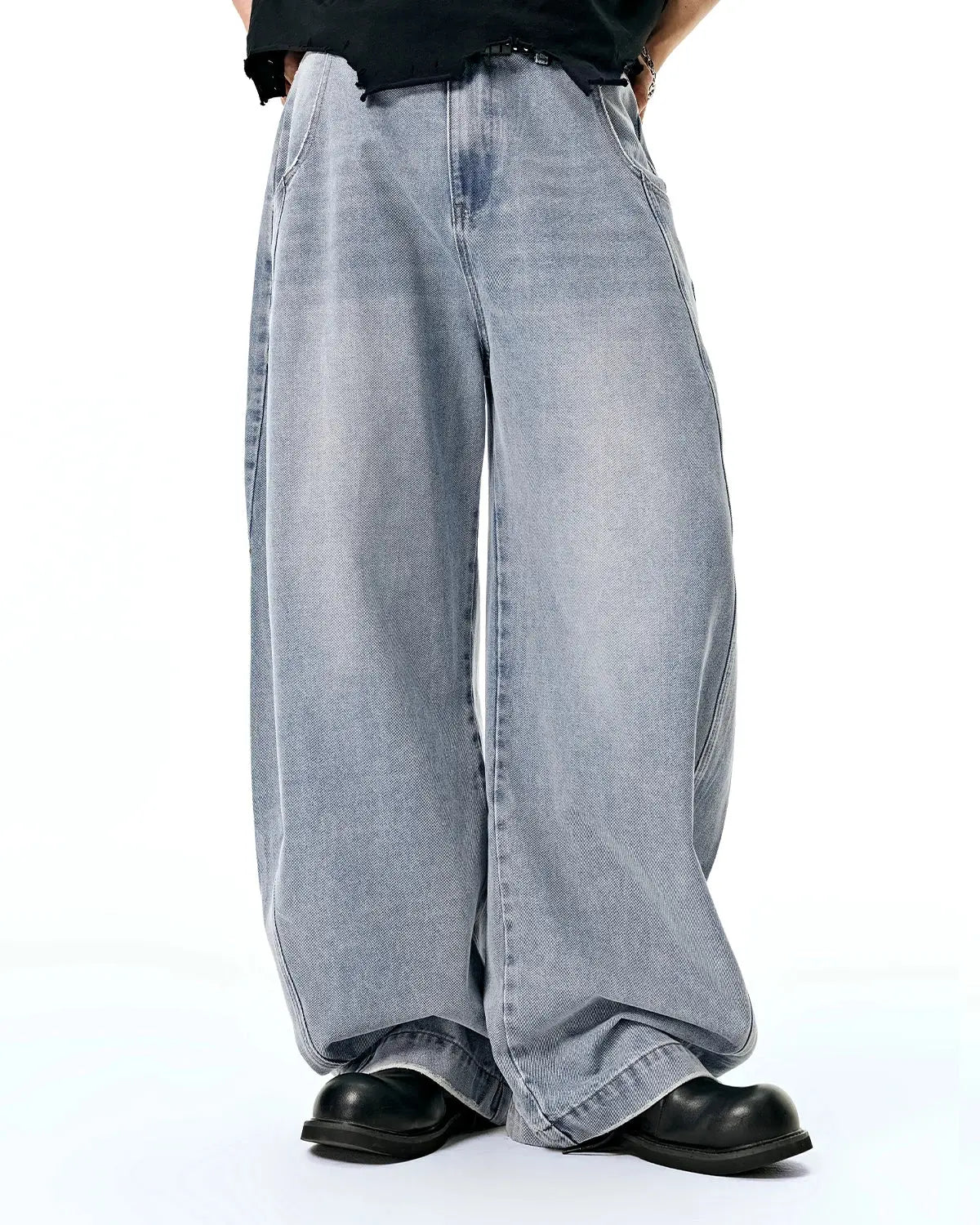 Flation acid-washed distressed barrel jeans, streetwear pants with a relaxed fit and faded, worn-in look.