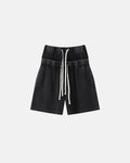Inflation Streetwear double waist acid wash waffle shorts, stylish pants with a unique wash and textured fabric, front view.