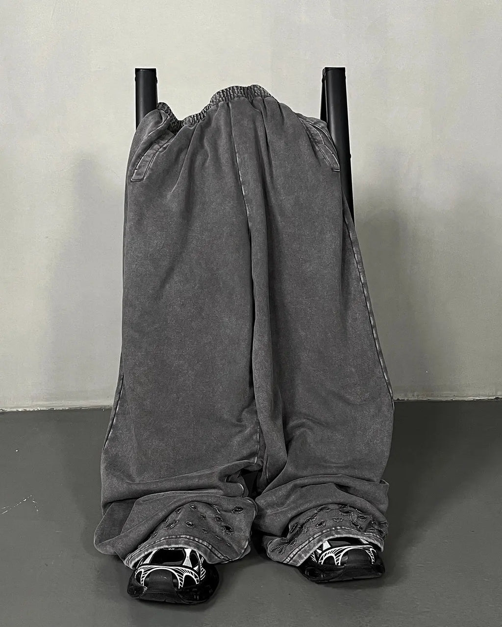 Flation ripped acid wash sweatpants with distressed details and relaxed fit, casual streetwear pants for a trendy look.