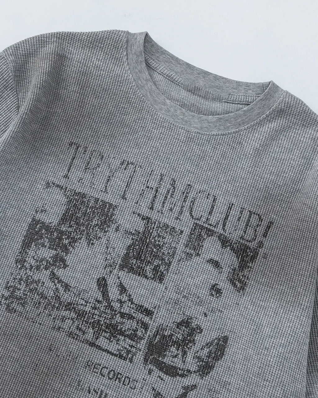 Inflation Streetwear distressed graphic waffle T-shirt featuring a casual fit and urban style with bold printed design.