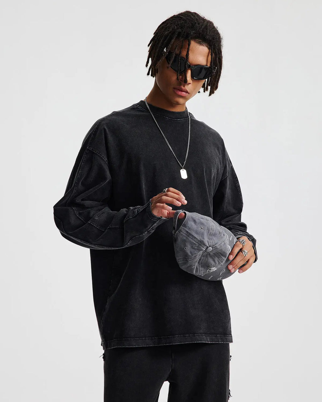 Distressed acid wash oversized long sleeve tee by Flation streetwear, featuring a relaxed fit and worn-in style.