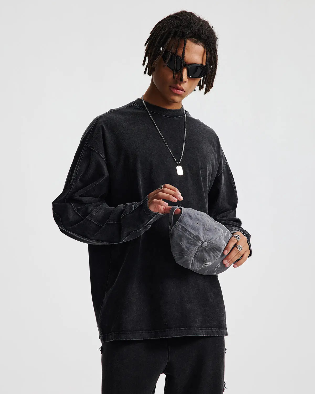 Distressed acid wash oversized long sleeve tee by Flation streetwear, featuring a relaxed fit and worn-in style.