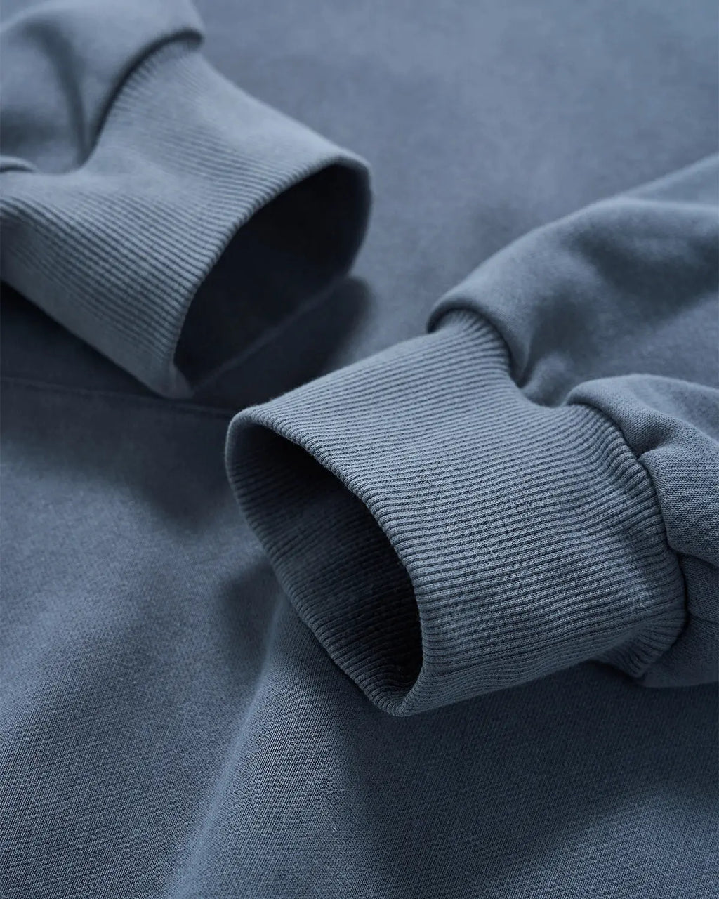 Inflation Streetwear garment washed French Terry hoodie in neutral color, featuring a relaxed fit and soft fabric texture.