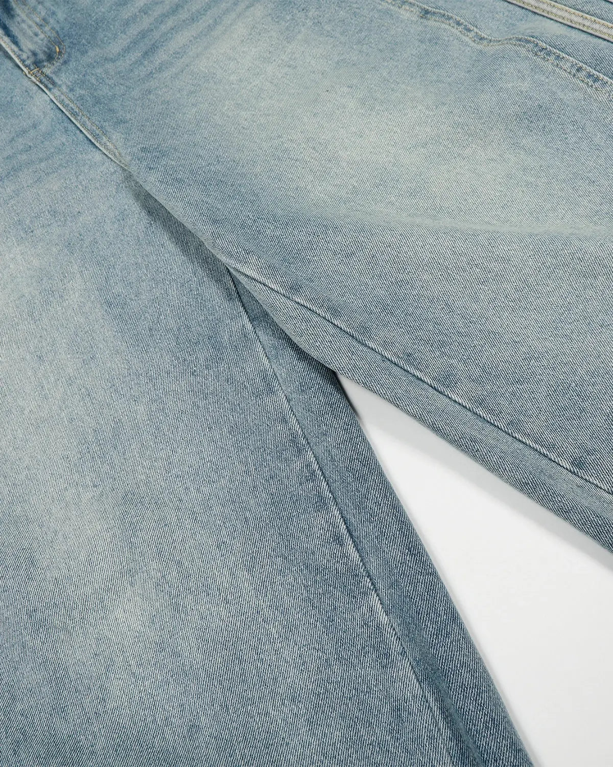 Acid wash striped side baggy jeans by INFLATION, featuring relaxed fit and faded denim with contrasting stripe details.
