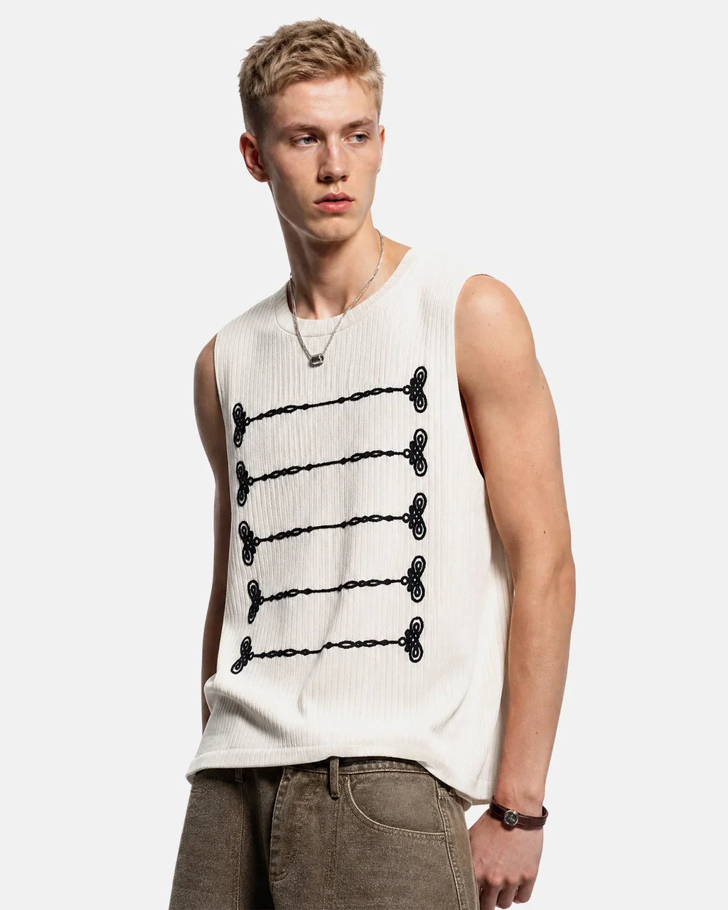 Embroidered knit tank top from INFLATION streetwear featuring colorful embroidery and a relaxed fit.