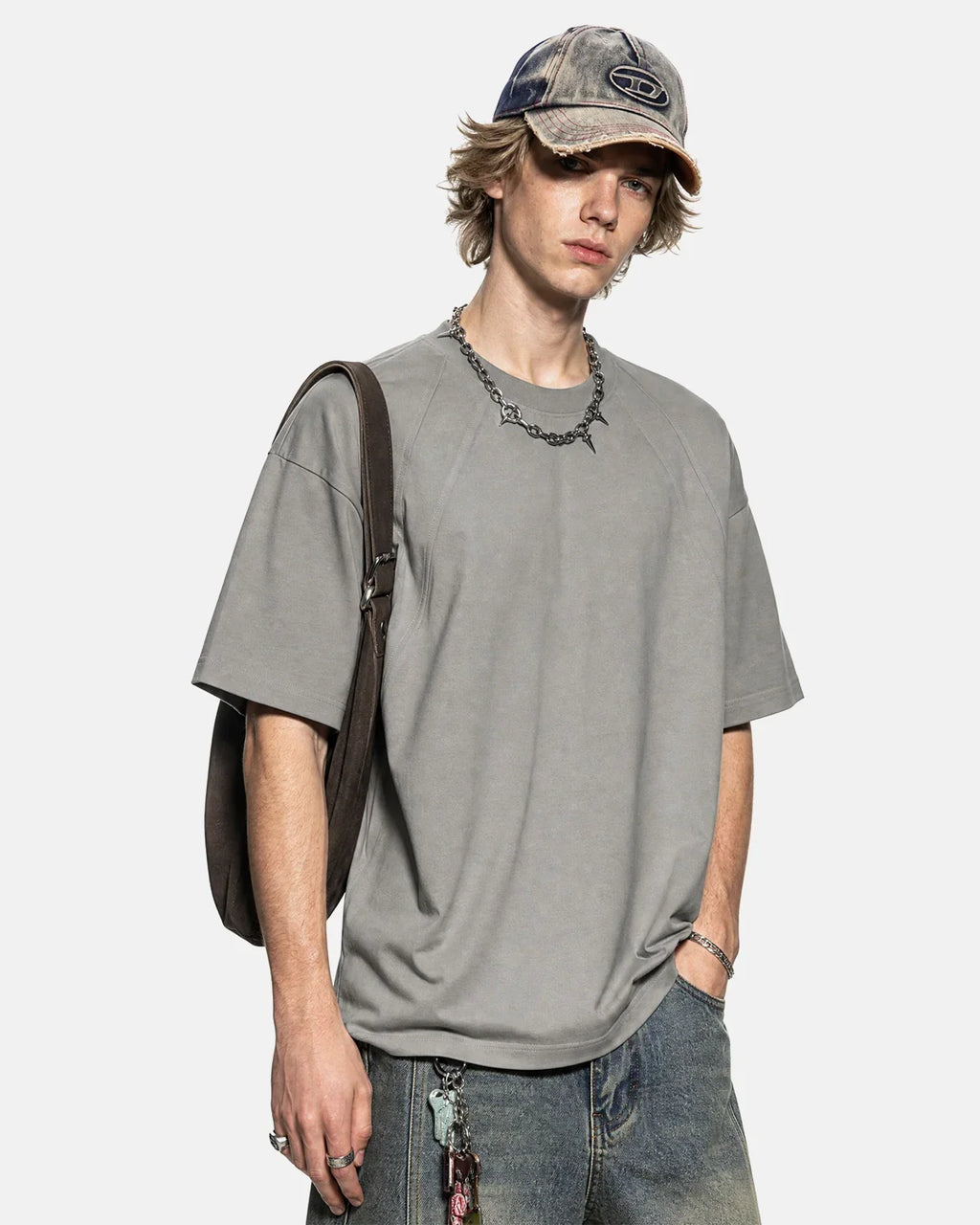 Boxy deconstructed T-shirt from INFLATION Streetwear featuring a relaxed fit and modern design in soft fabric.