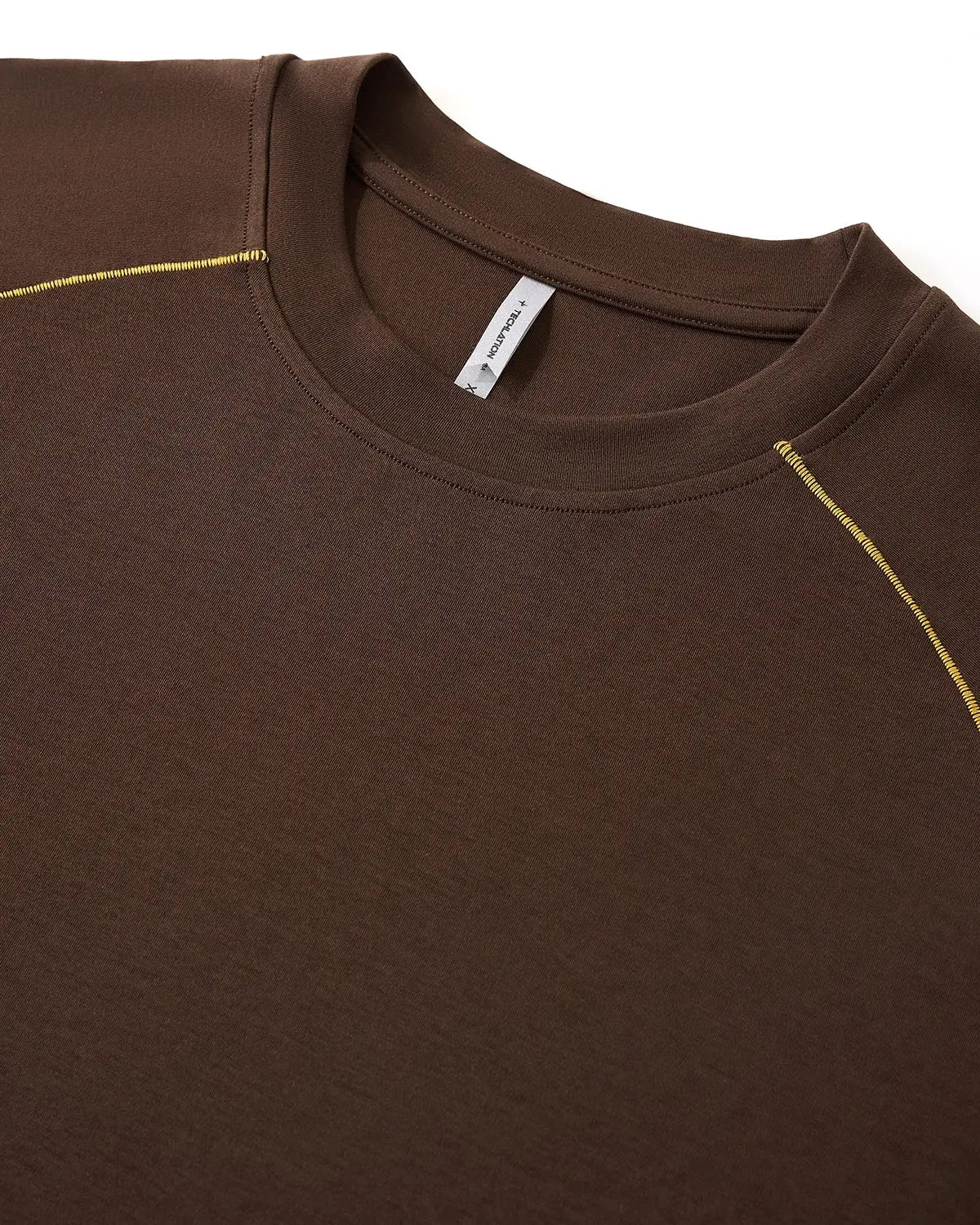 Lightweight INFLATION activewear tee with stitching details, casual streetwear style perfect for workouts or everyday wear.