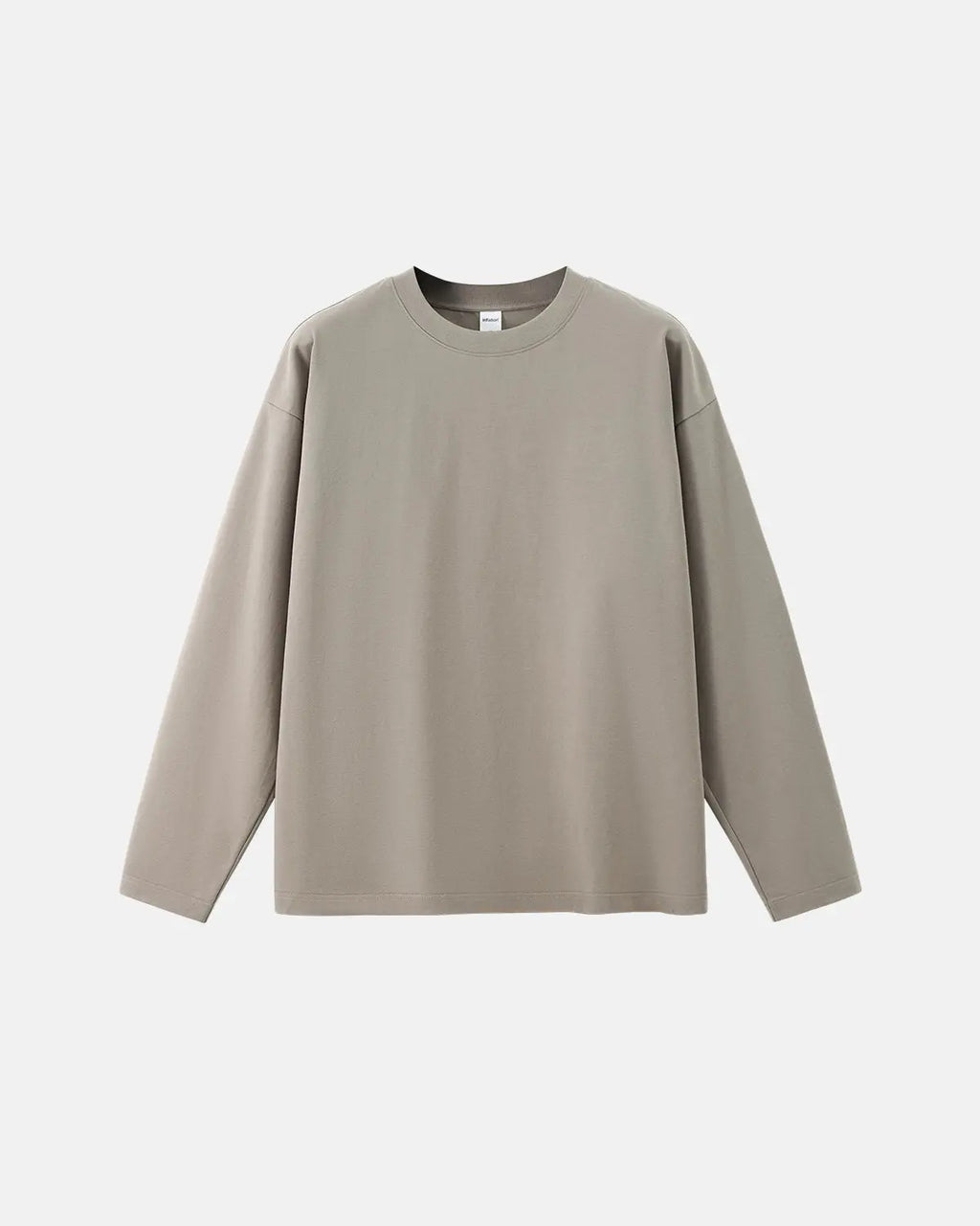 Plain white cotton long sleeve tee from Inflation Streetwear, featuring a classic fit and soft fabric for casual wear.