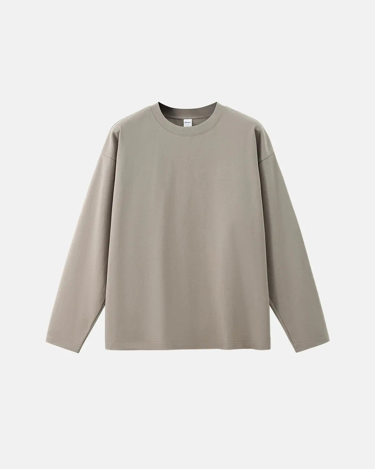 Plain white cotton long sleeve tee from Inflation Streetwear, featuring a classic fit and soft fabric for casual wear.