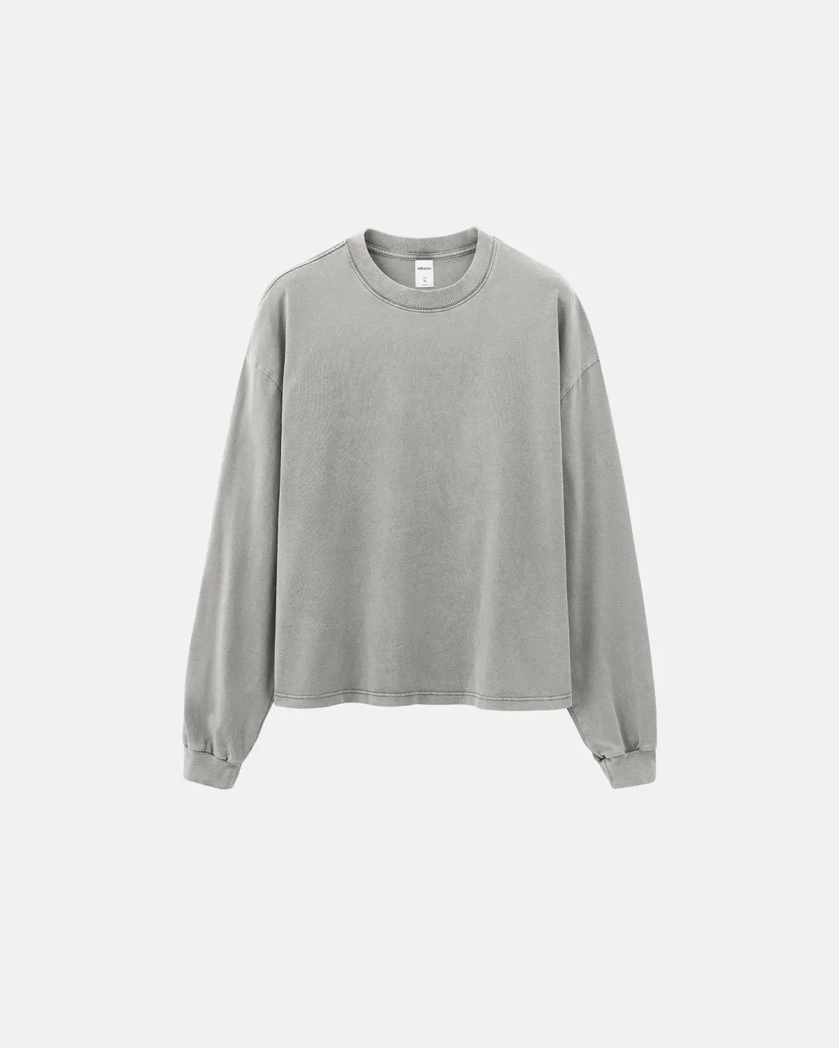 Distressed washed long sleeve T-shirt by INFLATION, featuring a vintage, faded look with frayed edges and casual streetwear style.