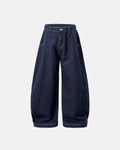 Raw washed barrel jeans by Flation Streetwear, showing distressed denim pants with a relaxed fit and classic five-pocket design.
