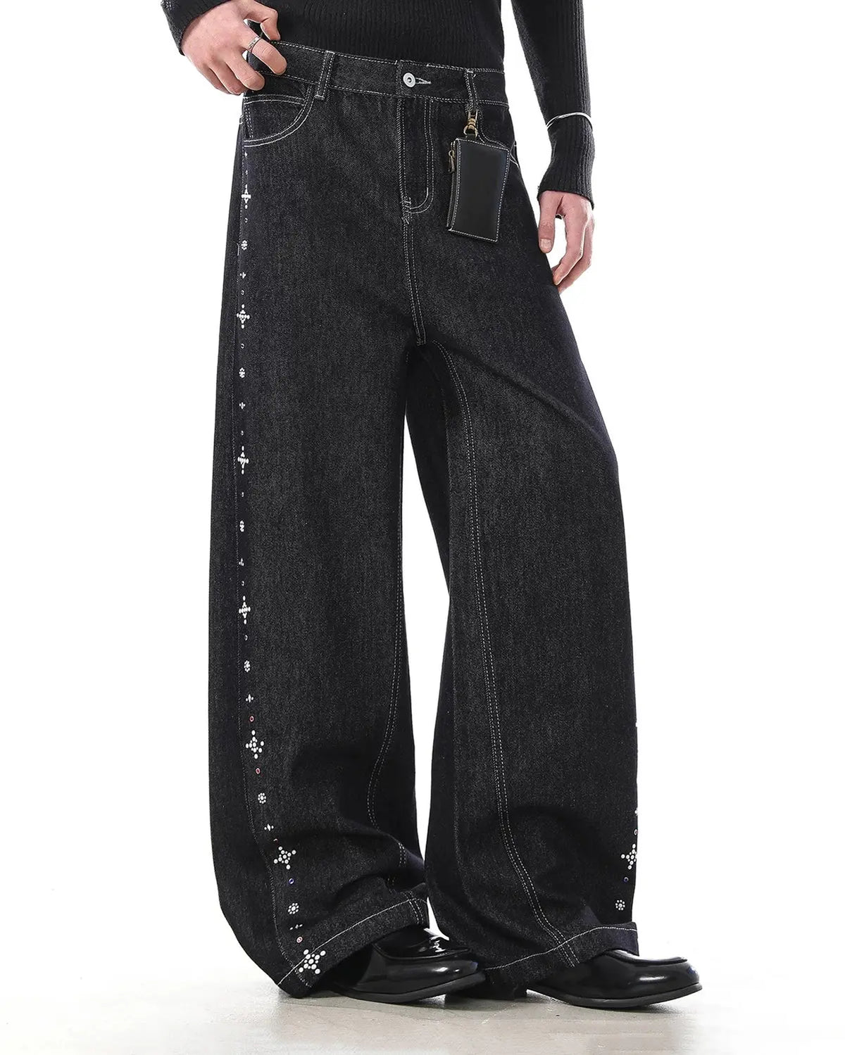 Inflation studded rhinestone baggy denim jeans featuring rhinestone embellishments and loose fit, streetwear style.