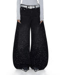 Acid wash rhinestone baggy jeans by INFLATION, featuring distressed details and rhinestone embellishments, casual streetwear style.
