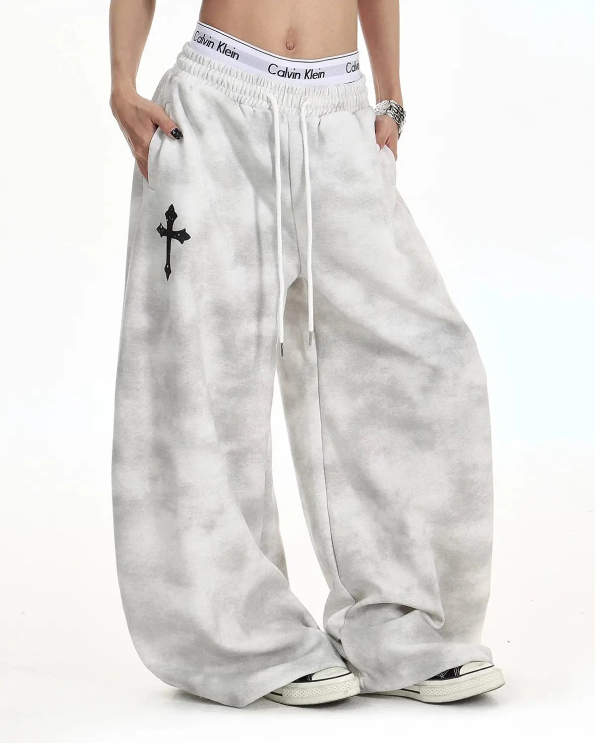 Washed gray cross barrel sweatpants from INFLATION streetwear, featuring a relaxed fit and stylish design.