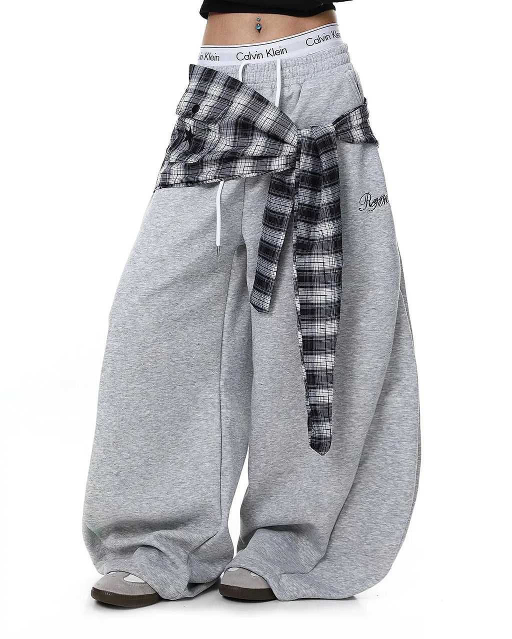 Inflation Streetwear plaid layered baggy sweatpants with a relaxed fit and layered design in a classic plaid pattern.