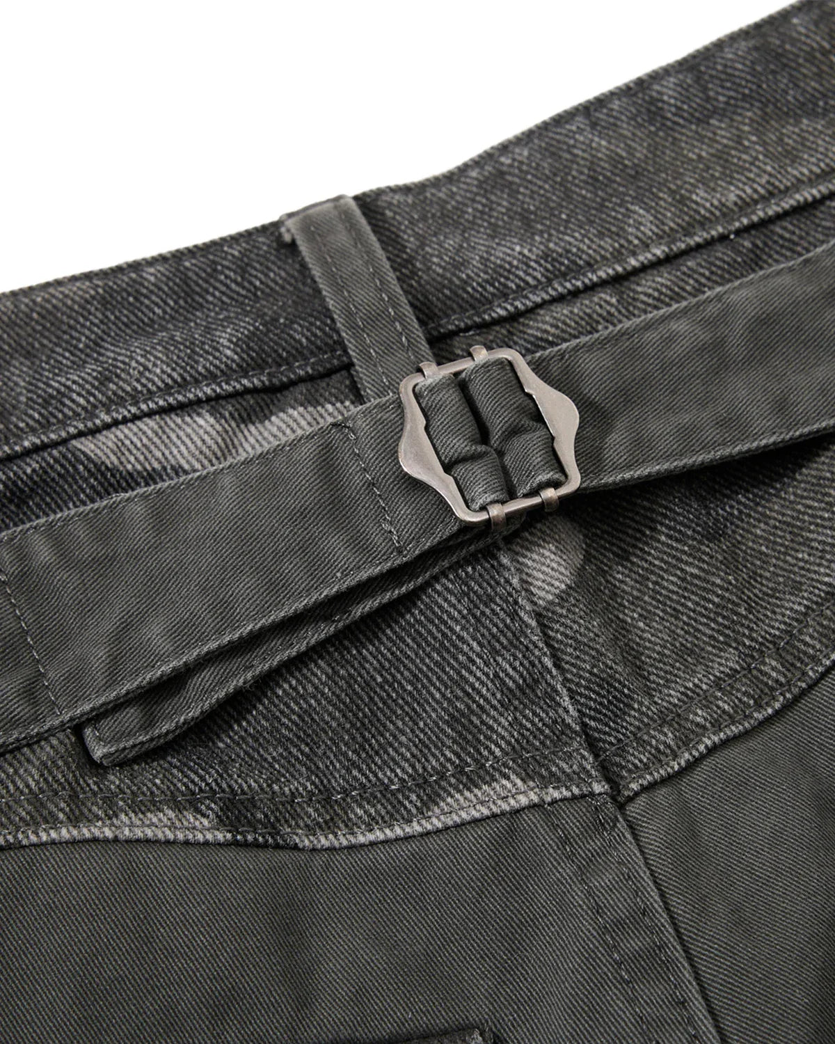Camo patchwork barrel pants by INFLATION featuring a relaxed fit, camouflage pattern, and streetwear style.
