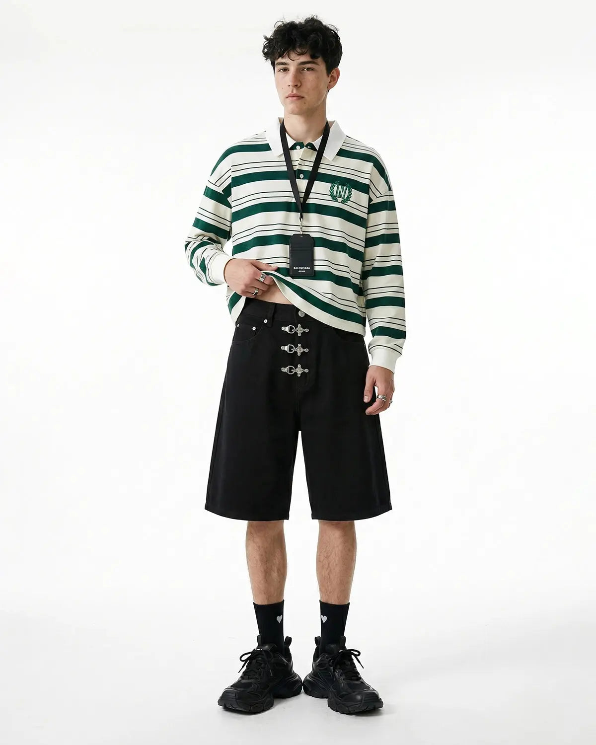 Metal clasp baggy jorts from INFLATION Streetwear featuring distressed denim, oversized fit, and metal hardware details.