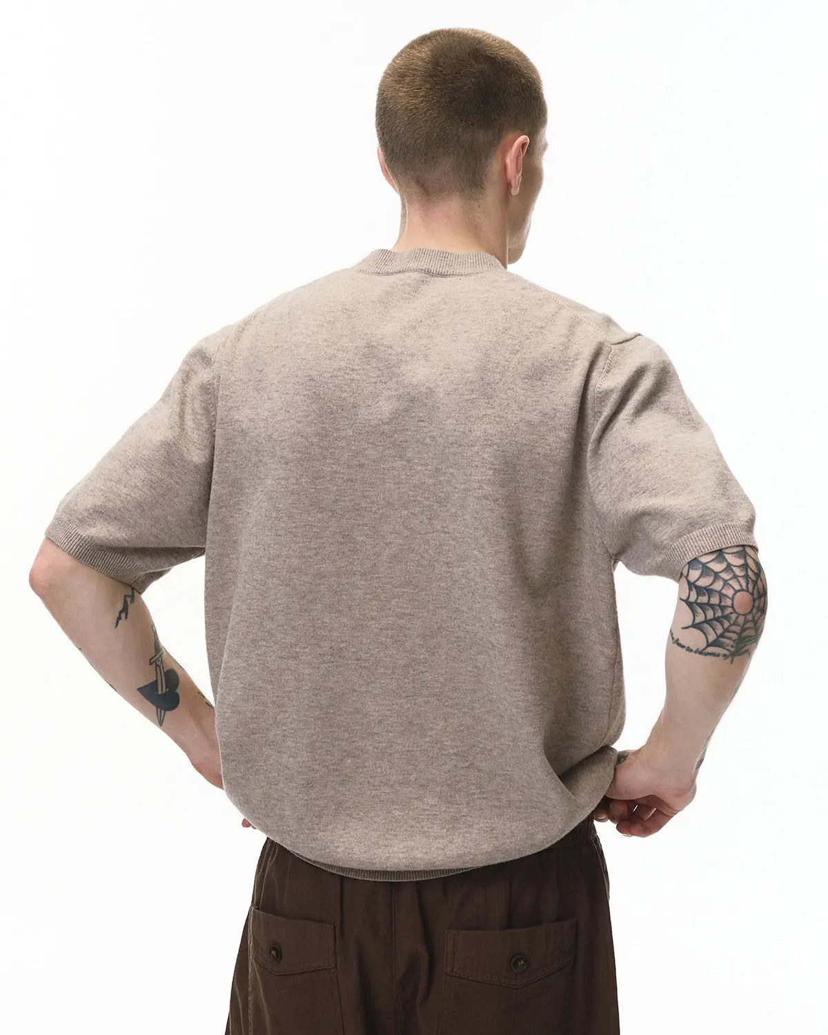 Inflation Streetwear short-sleeved crewneck sweater in soft knit fabric, showcasing a casual fit and classic design.