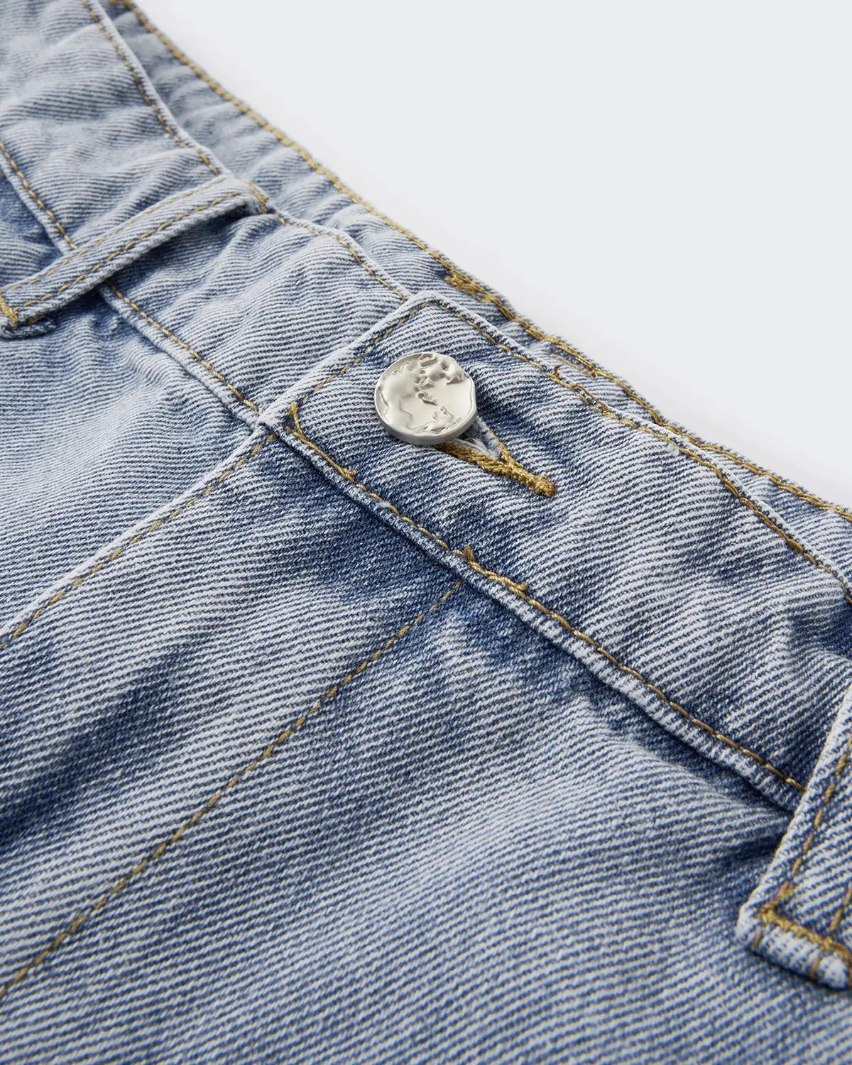 Flation acid washed distressed barrel jeans, streetwear pants with a relaxed fit and worn-in denim look, showcased on a model.