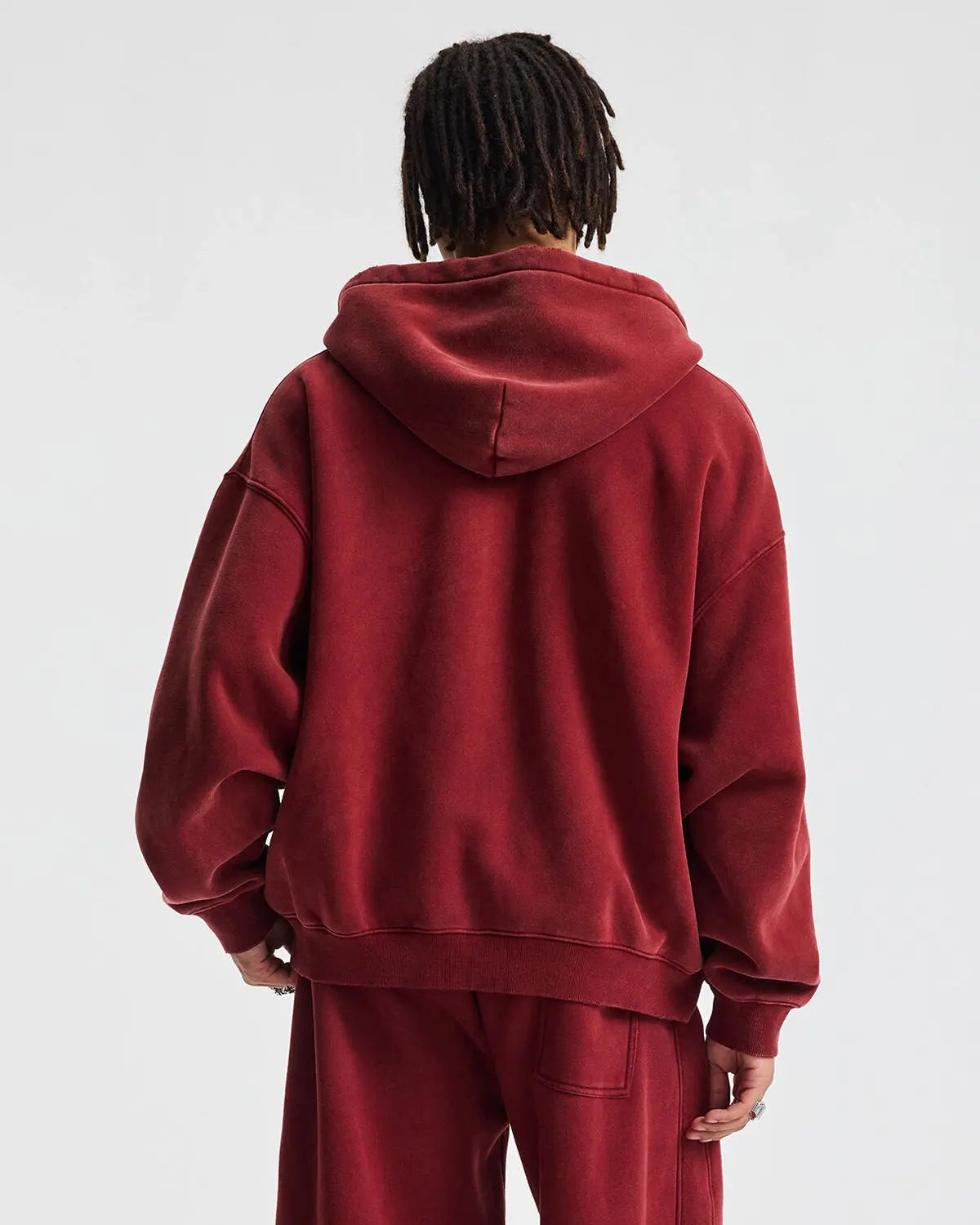 Boxy fit acid washed fleece zip-up hoodie by Flation, featuring a casual design with a front zipper and hood, displayed on a hanger.
